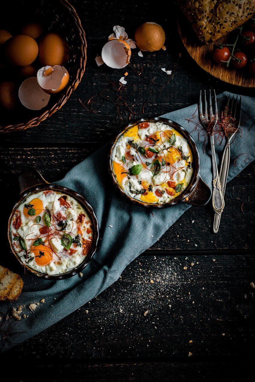 2 dishes of food with fresh ingredients